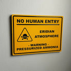 Yellow warning sign on wall with skull symbol and text no human entry, Eridian atmosphere, pressurized ammonia