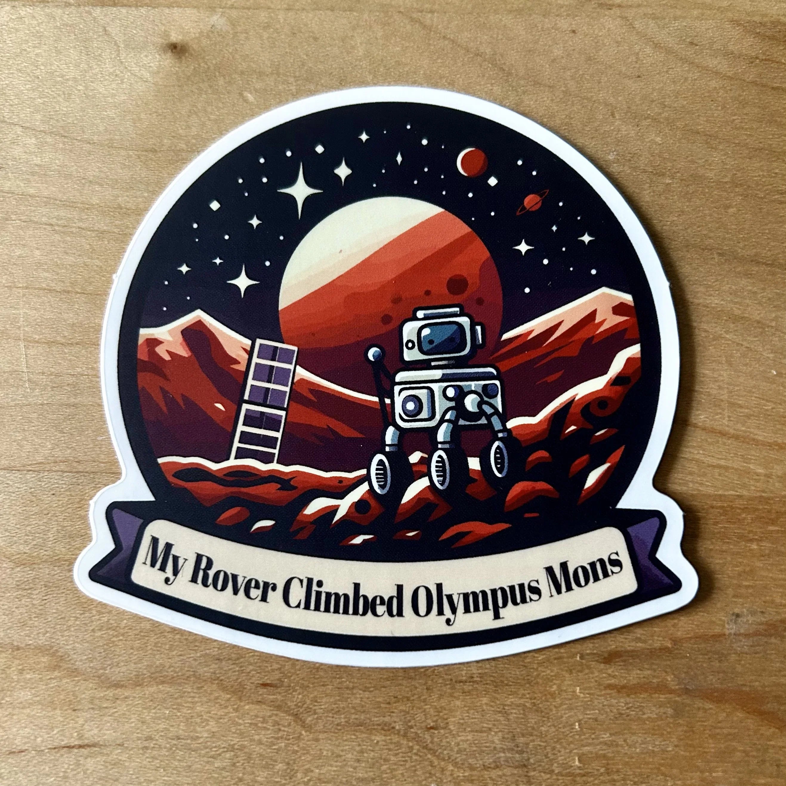 Sticker showing Mars rover on red rocky Olympus Mons with Mars and stars in background