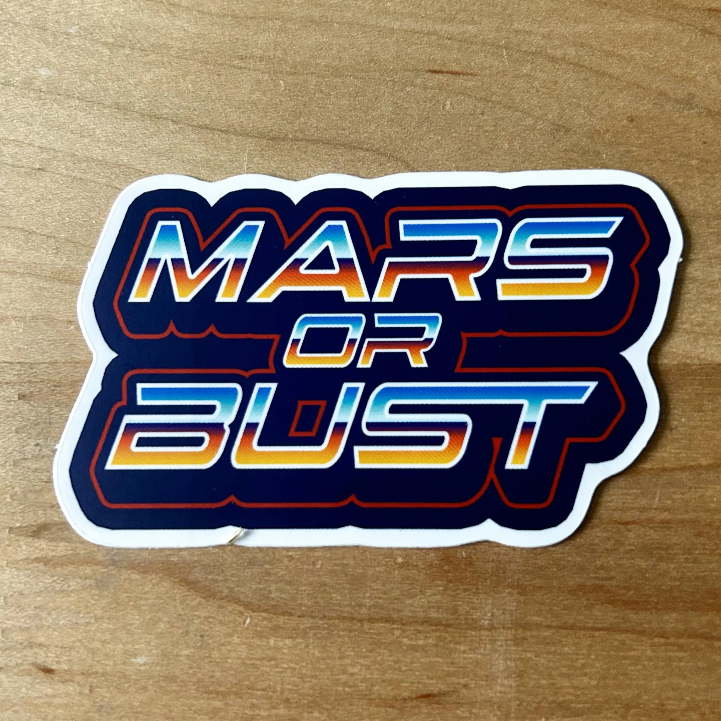 Sticker with bold retro-style text "MARS OR BUST" in gradient blue and orange on dark background