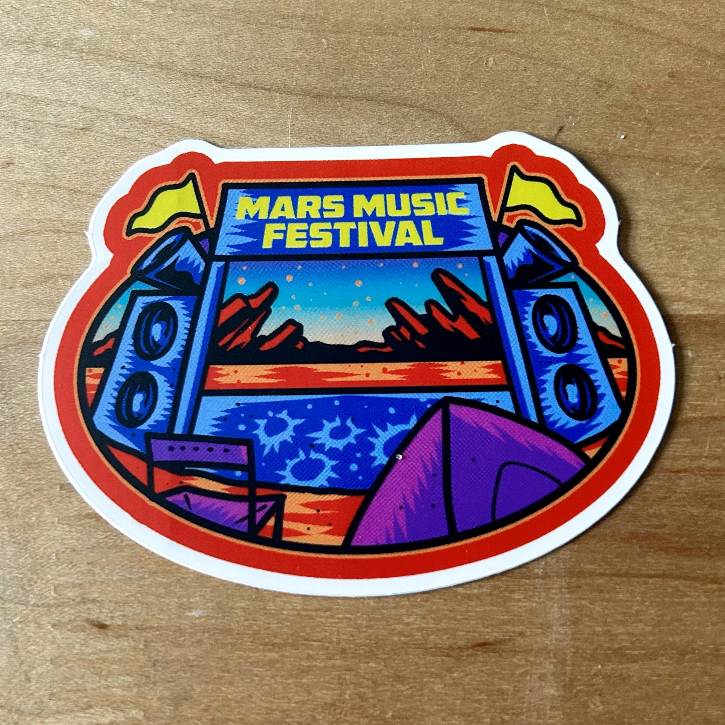 Mars Music Festival sticker with speakers, purple tent, chair, and desert landscape illustration
