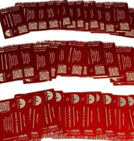 Rows of red marathon bibs with participant numbers and event details neatly arranged