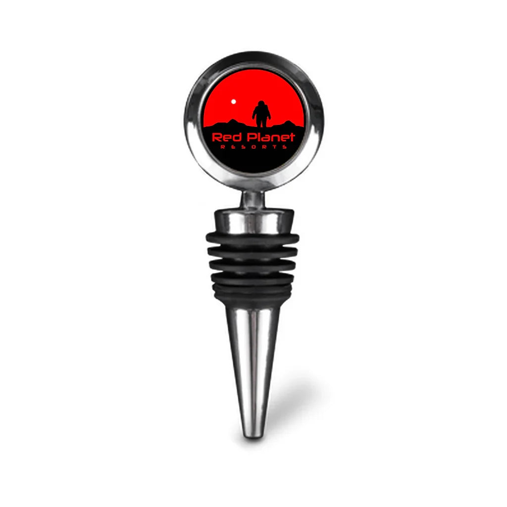 Red Planet Resorts metal wine stopper with astronaut and red planet logo