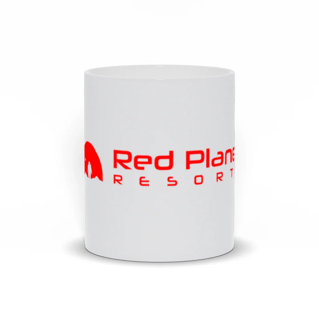 White ceramic mug with Red Planet Resort logo in red featuring a silhouette and text
